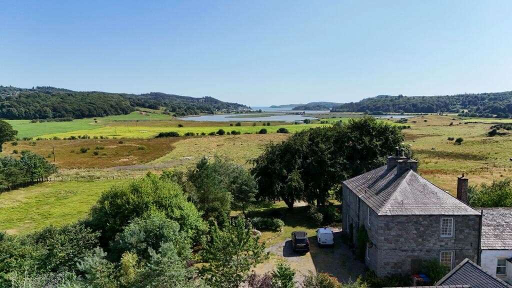 Aerial view of Meikle Richorn looking across land to the Urr Estuary
