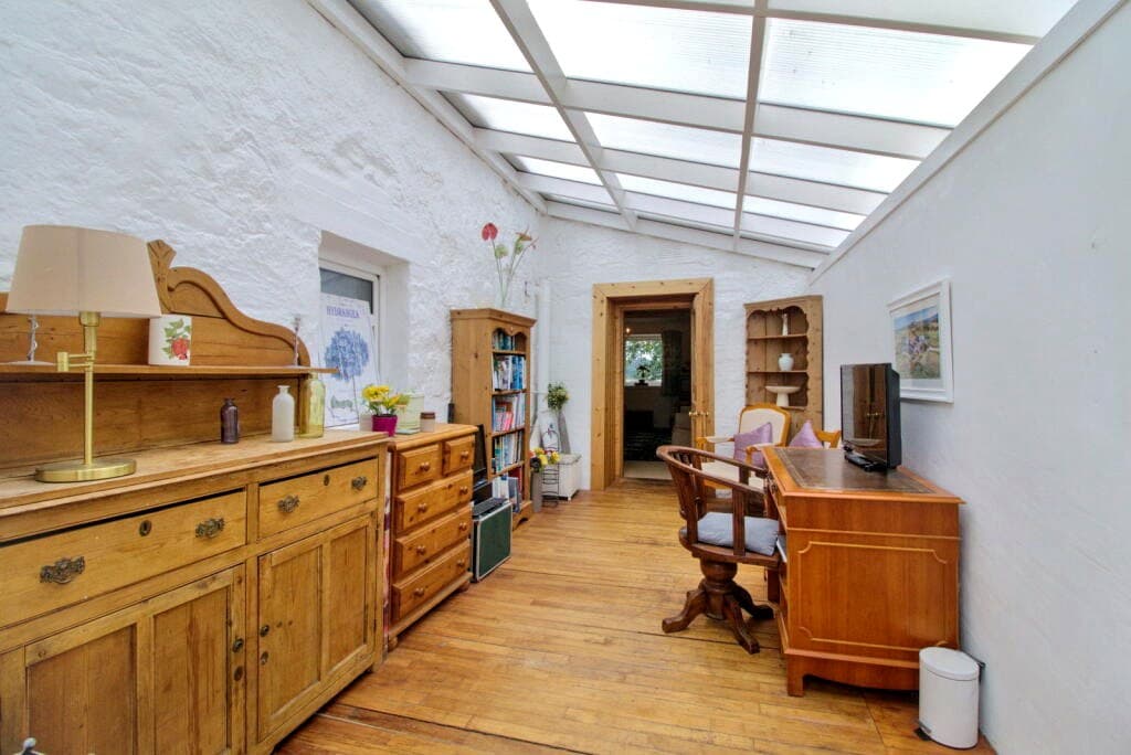 Sun porch and utility space inside Meikle Richorn